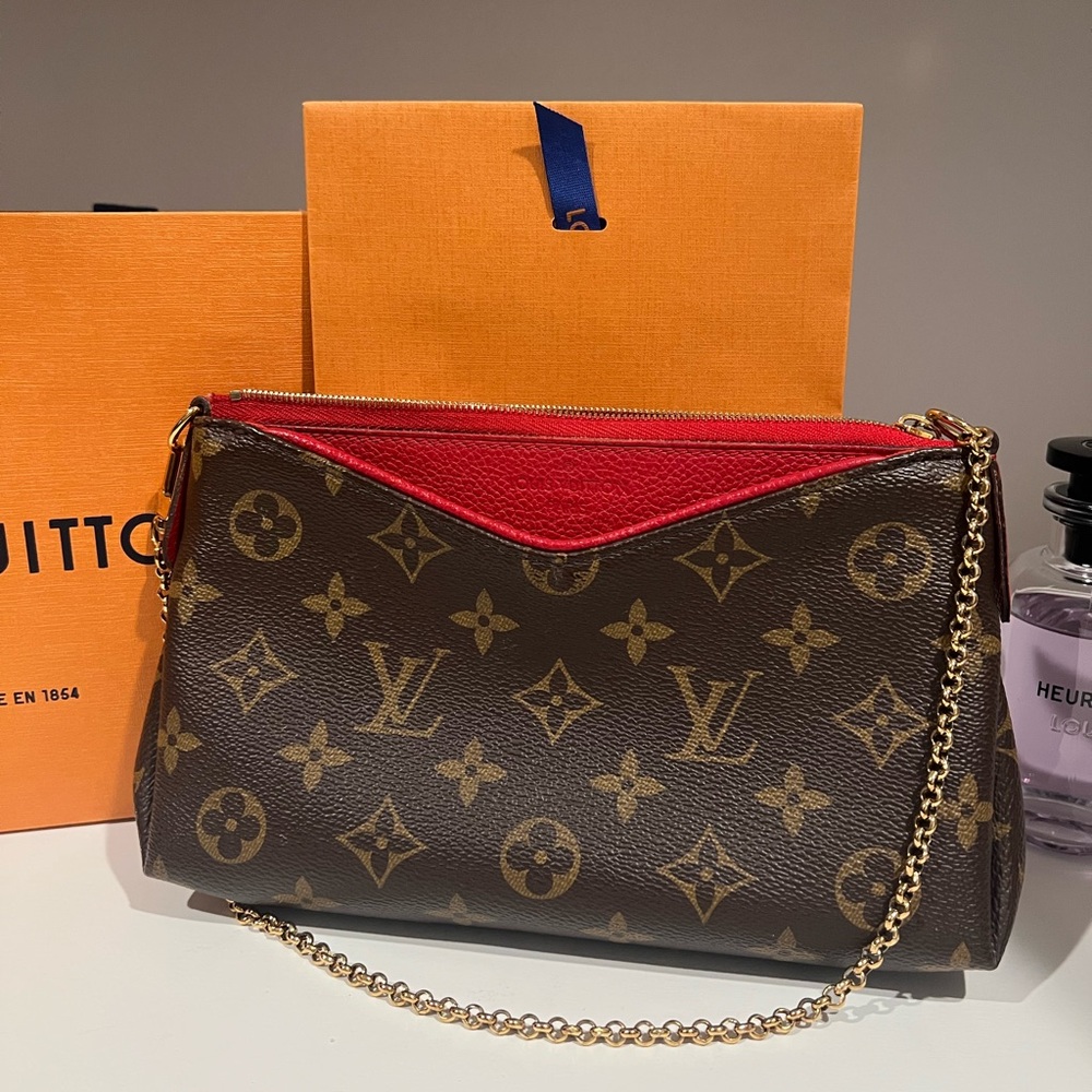 Louis Vuitton Pallas clutch.  Monogram Crossbody Bag